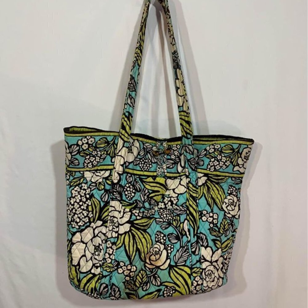 Vera Bradley duffle bag. Teal/yellow. Tortoise buckle. 9 compartments. Some wear